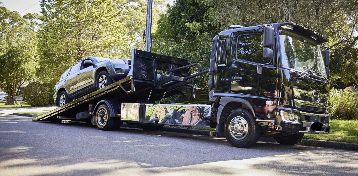Professional tow truck providing emergency towing service in Woodridge, Illinois